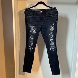 Women's Distressed Blue Jeans